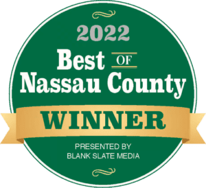 A green and white logo for the best of nassau county.